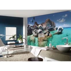 Fototapete Vlies Meer Felsen Palmen blau braun